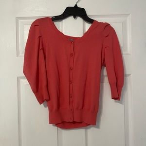 Coral/peach colored cardigan